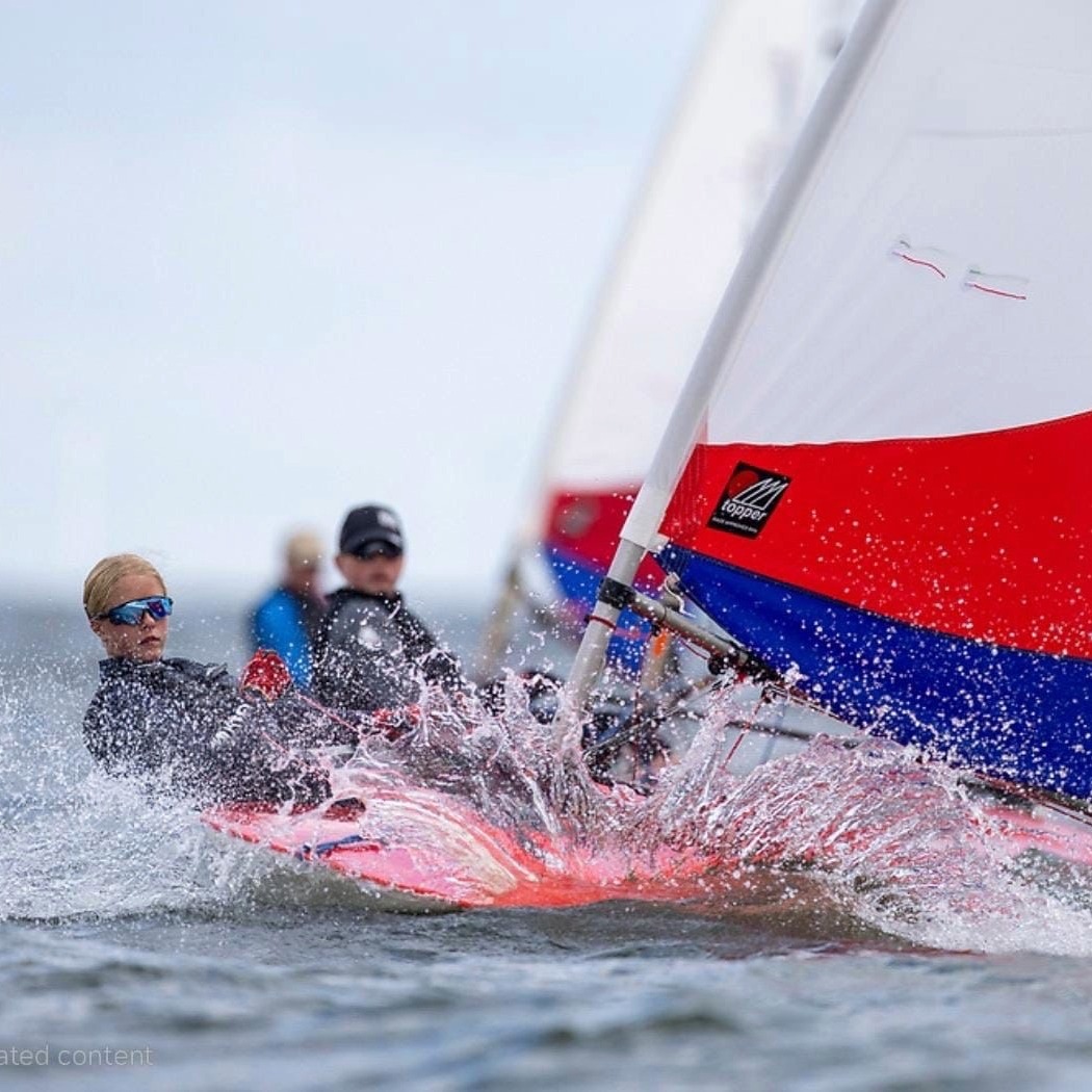 Faith sailing in a Topper